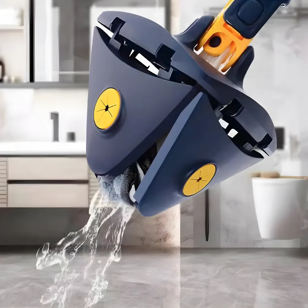 Image shows a triangular mop head being wrung out effortlessly by pulling the extendable handle. Quick and convenient water drainage keeps hands dry and cleaning efficient.