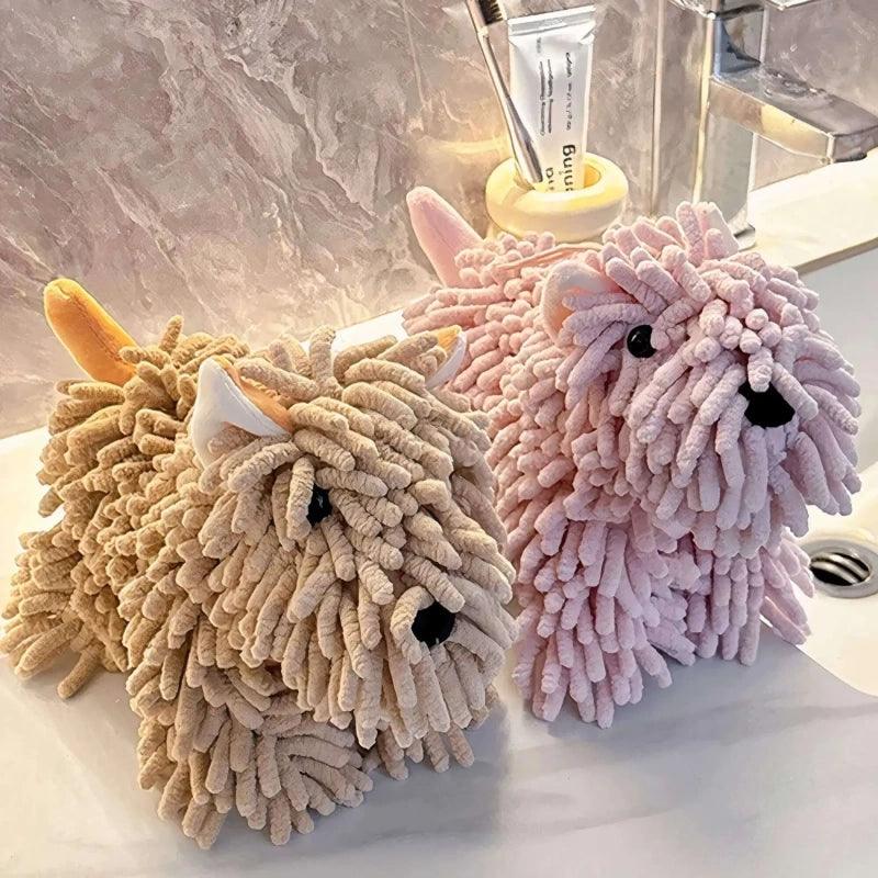 Tan and pink dog-shaped hand towels made of soft chenille material, plush and cute for chic home use