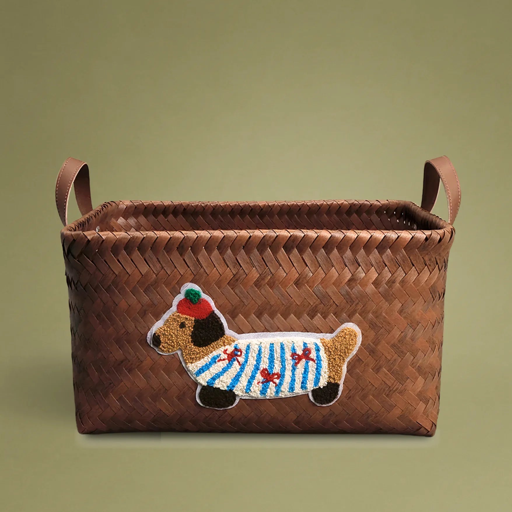 Handwoven wicker storage basket with dachshund embroidery, made from recycled plastic, ideal for home storage and decoration