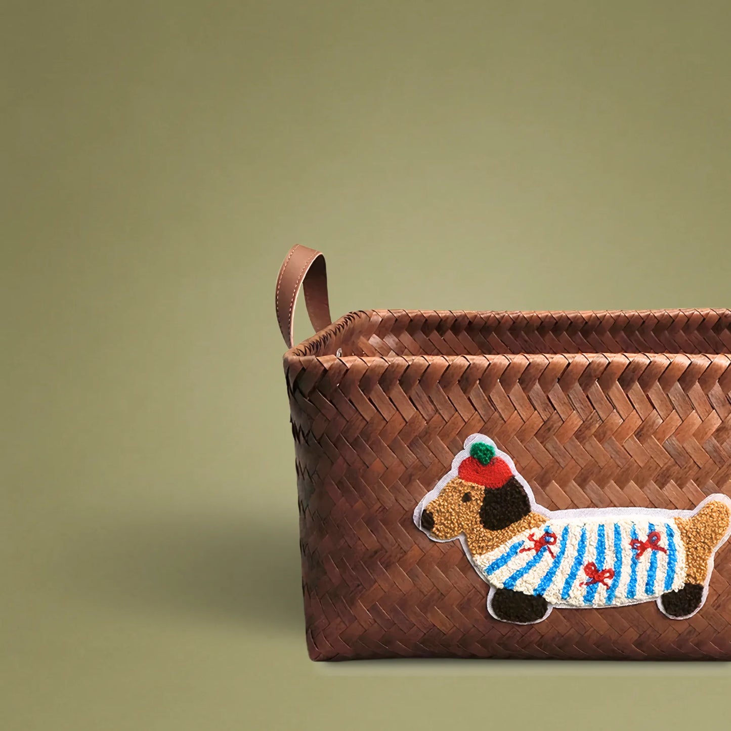 Handwoven wicker storage basket with cute puppy embroidery, perfect for home organization and stylish decor
