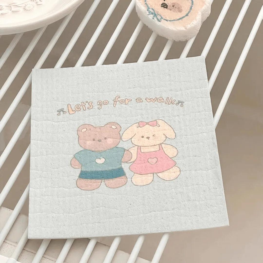 Bear-print cellulose towel drying naturally on an open rack.