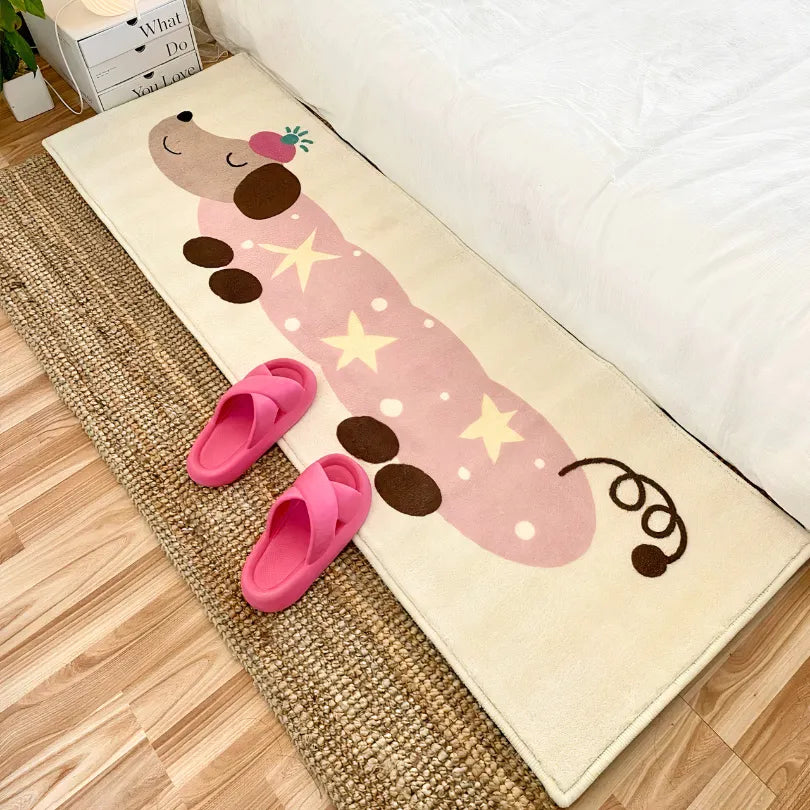 Pink star striped dachshund faux cashmere bedside throw placed next to a bed, featuring a cozy, plush texture ideal for stylish and playful bedroom decor.