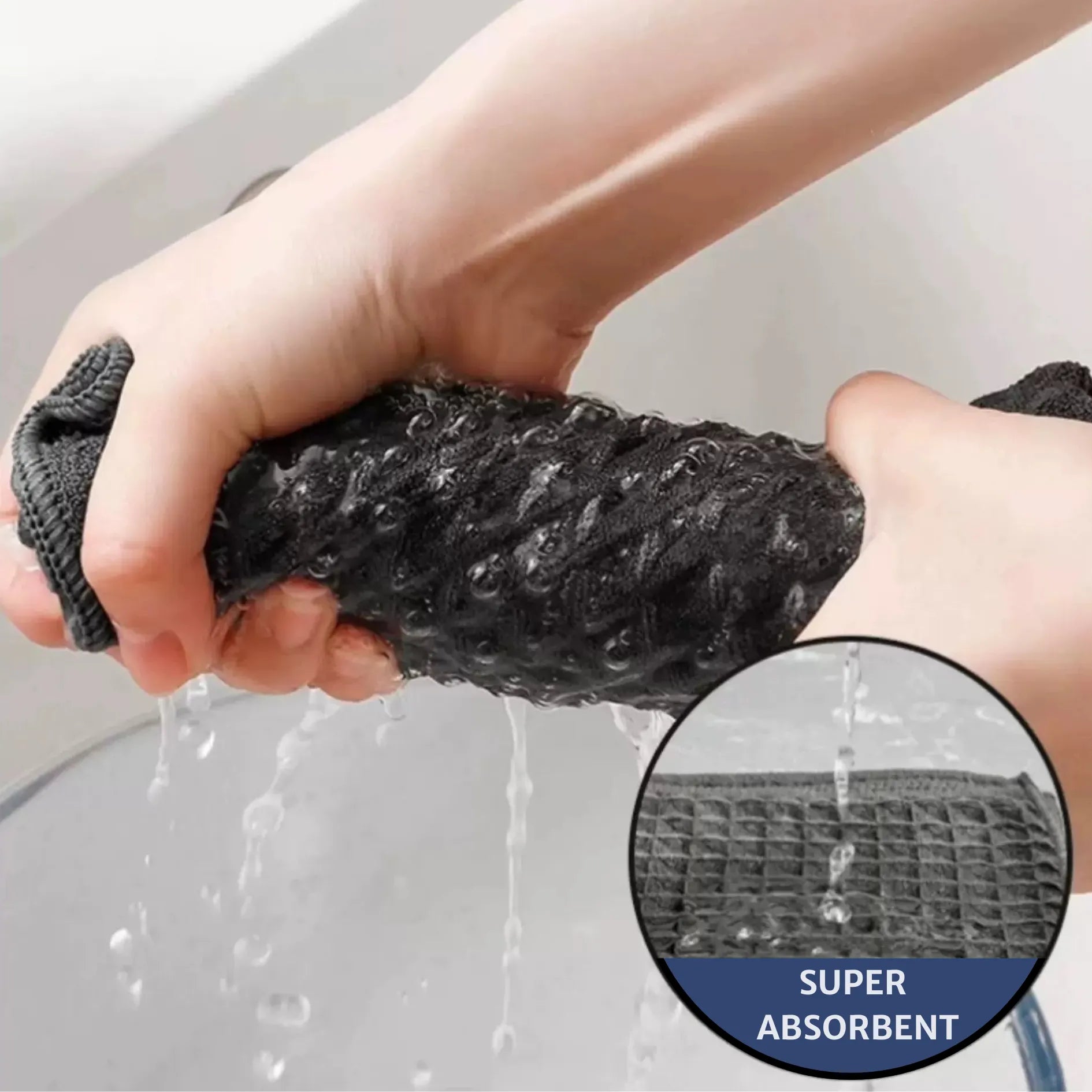 A person twisting a waffle pattern microfiber cloth with water pouring out, demonstrating its super absorbent and quick-dry properties ideal for kitchen and household use.