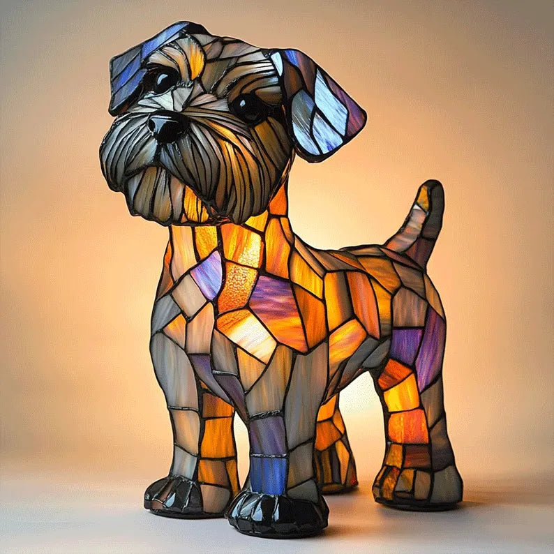 Stained glass dog-shaped lamp with multicolored design on a plain background