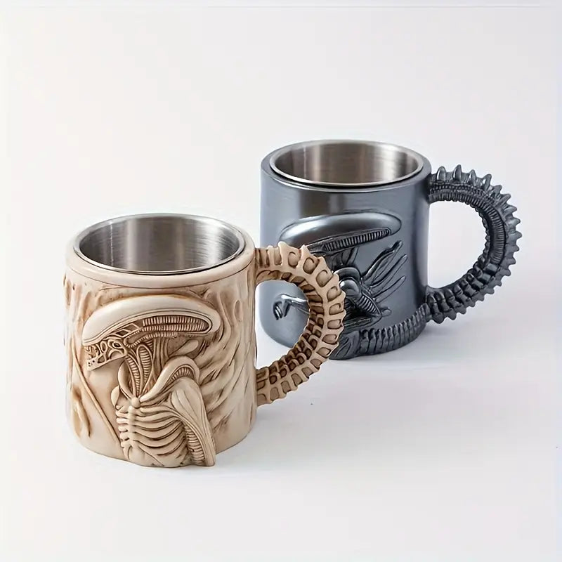 Two unique mugs with alien design handles on a white background