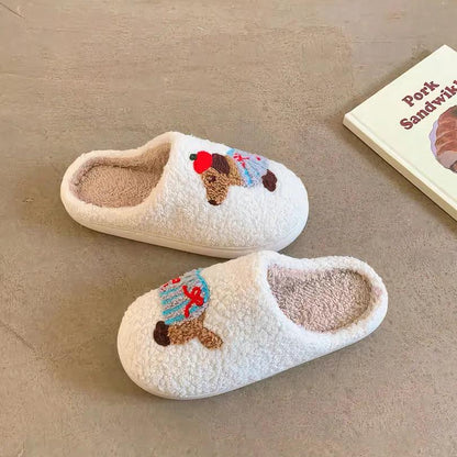 A pair of fuzzy white memory foam house shoes with a soft, comfortable feel, featuring a cute striped dachshund design, placed on a light brown floor.