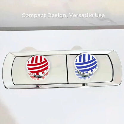 Red and blue striped acrylic covers attached to a dual toilet flush button, showing multifunctional use for dachshund toilet seat lifters.