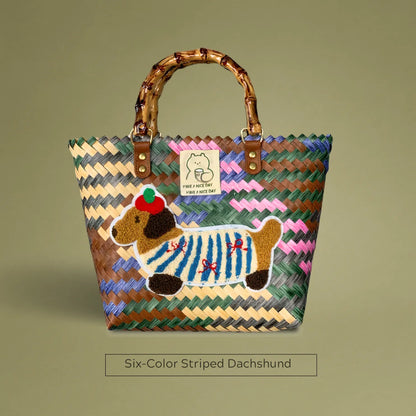 Handwoven bamboo tote with colorful six-stripe dachshund embroidery, blending vintage charm with playful style for a chic everyday look.