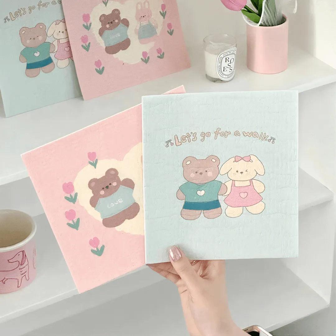 Cute eco-friendly bear-print towels shown as trendy kitchen decor items.