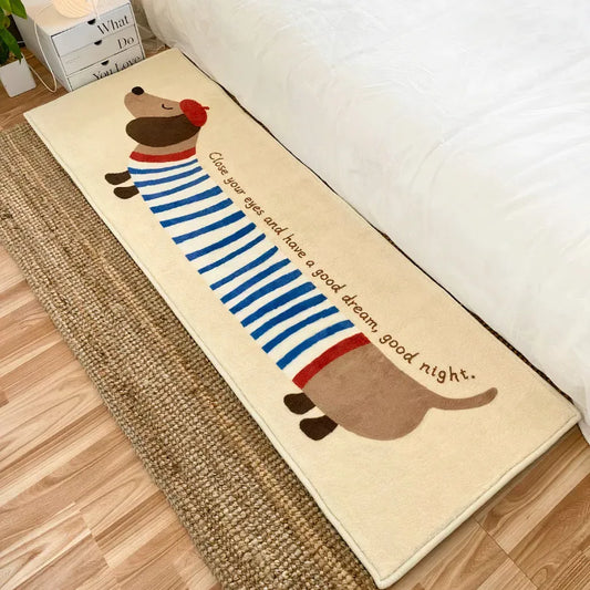 Striped dachshund faux cashmere bedside throw placed next to a bed, featuring a soft, cozy design perfect for elegant and stylish female home decor.