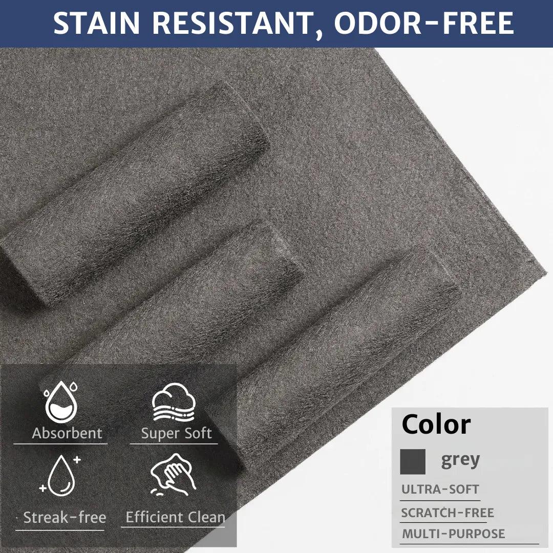 Three rolled microfiber cloths highlighting key features: super absorbent, strong stain resistance, odor-free, ultra-soft texture, and streak-free cleaning for versatile household use.