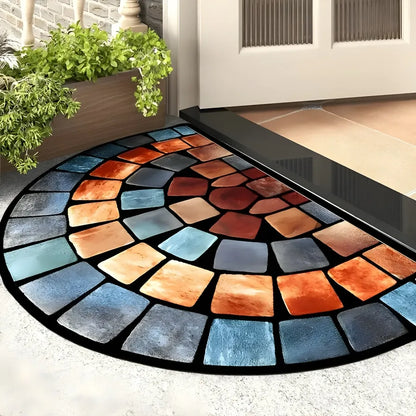 Soft material boho mosaic rug with geometric patterns in blue and orange tones at doorway with plants.