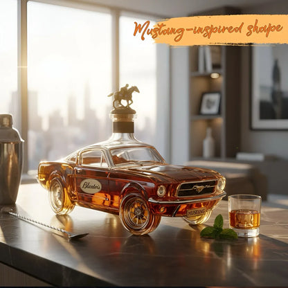 Mustang-shaped whiskey decanter with a glass of whiskey on a table.