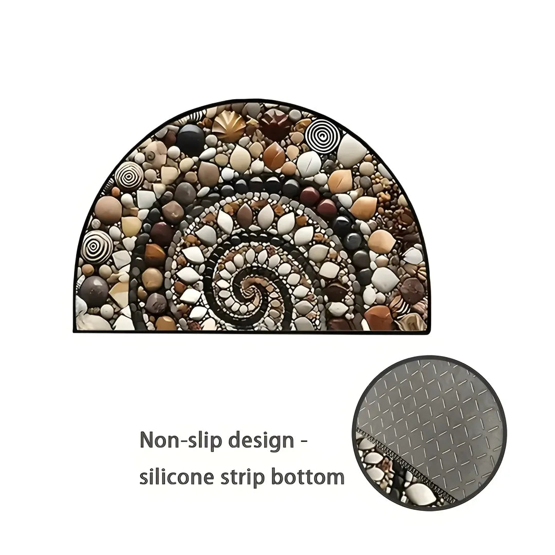 Pebble door mat with non-slip silicon strip bottom, showing spiral stone pattern and textured rubber grip.