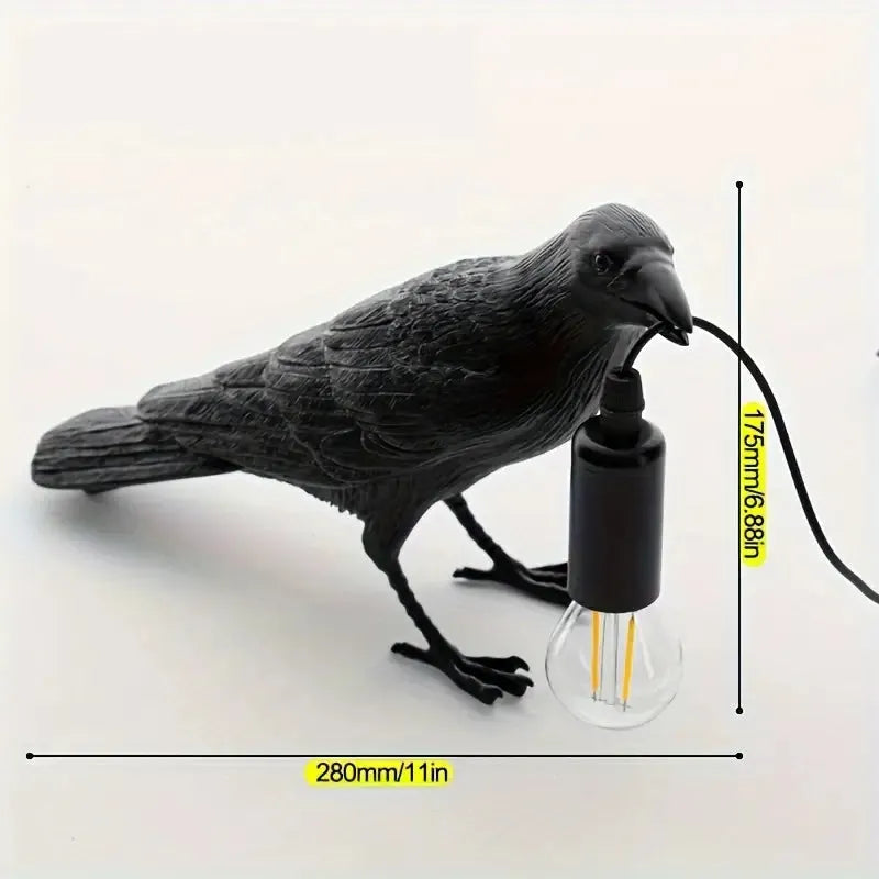 Bird-shaped lamp with a light bulb, shown with measurements on a white background
